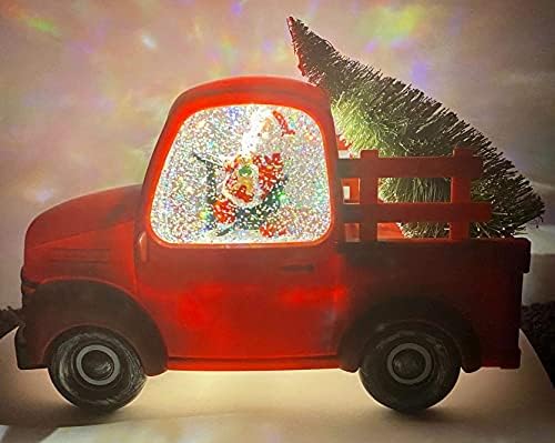סן פרנסיסקו קופסת המוזיקה המוזיקלית סנטה במשאית אדומה עם מים מסתובבים